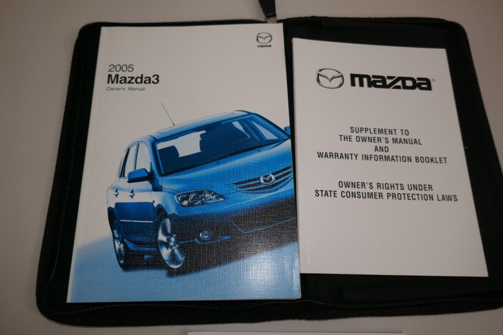 Picture of: Mazda  Mazda Owner’s manual with zip case
